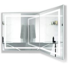 a bathroom mirror that is open to show the reflection of a person's bathrobe