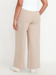 elasticized waist hip pockets seamed front leg pockets fit your phone go-dry wicks moisture pull-on style sits at belly button loose hip and thigh wide leg 30 1/2" regular inseam 28 1/2" petite inseam 33 1/2" tall inseam models are approx.  5'9" and wear sizes s (4), l (12), and xl (18)machine wash according to the care instruction label Comfortable Pull-on Style Workwear Bottoms, Comfortable Pull-on Style Bottoms For Workwear, Full Length 4-way Stretch Pull-on Pants, High Waist Bottoms With Comfort Waistband For Work, Comfortable Wide Leg Bottoms With Elastic Waistband, Comfortable Wide-leg Pull-on Bottoms, Pull-on 4-way Stretch Trousers, 4-way Stretch Wide-leg Pants With Pockets, Wide-leg Pants With Pockets And 4-way Stretch