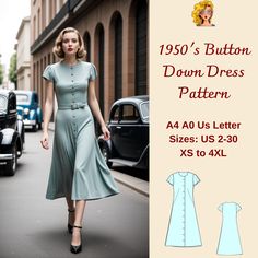 a woman is walking down the street wearing a dress with buttons on the front and side