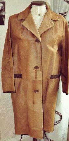 "Vintage 60s Fawn Ponyskin 3 Button Coat. Lovely and smart coat from the 60s, made by Wm Galt and Sons of Glasgow. The coat is made from animal hide which I believe is ponyskin. The coat closes with 3 brown plastic buttons. The coat features pockets, one at each hip and these are trimmed with dark brown leather, which is a lovely smart detail. The coat is lined with a dark brown satin with little flowers, the lining is in perfect condition, as is the rest of the coat. The coat has been professio Brown Long Fur Coat For Work, Classic Brown Fur Coat For Work, Classic Brown Long Fur Coat, Classic Long Brown Fur Coat, Smart Coat, Animal Hide, Size 12 Uk, Brown Satin, Little Flowers