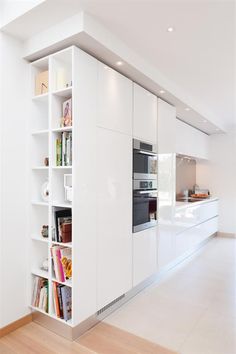 the kitchen is clean and ready to be used as a storage area for cookbooks