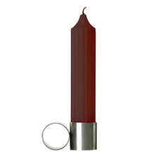 a red candle with a silver ring on the end is shown in front of a white background