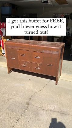 an old dresser sitting on the sidewalk with a sign saying i got this buffet for free, you'll never guess how it turned out