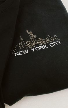 Sweatshirts are unisex sizing. Relaxed fit, true to size. If you want an oversized look, go two sizes up from your normal size. Perfect cozy gift for yourself or a special person in your life. Minimalistic approach with a modern design of New York City that will surely make a bold statement. This embroidered sweatshirt will be the only New York City sweatshirt you'll need. Features: 8-ounce, 50/50 cotton/poly Double-needle stitching at waistband and cuffs 1x1 rib knit collar, cuffs and waistband Working At Starbucks, City Sweatshirt, Gifts For Girlfriend, Cozy Gift, Vintage Soft, Sweatshirt Crewneck, Embroidered Sweatshirt, Girlfriend Boyfriend, Big Apple