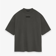 The Essentials Crewneck T-Shirt Is Made In The Core Cotton Jersey. The Rib-Knit Crewneck Fits Relaxed In The Body With Dropped Shoulders. New Minimalist Branding Is Seen In The Rubberized Essentials Fear Of God Black Bar On The Center Front. The Fear Of God Rubberized Label Is At The Back Collar. Basic Streetwear T-shirt With Ribbed Neckline, Basic T-shirt With Ribbed Neckline For Streetwear, Casual T-shirt With Ribbed Neckline For Streetwear, Basic Tops With Ribbed Neckline For Streetwear, Relaxed Fit T-shirt With Ribbed Neckline For Streetwear, Crew Neck T-shirt With Ribbed Neckline For Streetwear, Streetwear T-shirt With Ribbed Crew Neck, Oversized Short Sleeve T-shirt With Ribbed Neckline, Short Sleeve Streetwear Tops With Ribbed Neckline