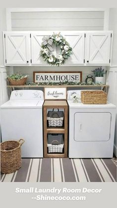 a white washer and dryer sitting inside of a laundry room