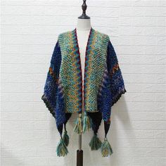 SPECIFICATIONSThickness: STANDARDStyle: CasualSeason: All seasonPattern Type: OtherOrigin: Mainland ChinaMaterial: PolyesterClosure Type: Open StitchCN: Zhejiang Blue One Size Shawl For Winter, Blue One-size Winter Shawl, Casual Winter Poncho With Tassels, Winter Knit Shawl One Size, Knitted One-size Shawl For Winter, Bohemian Knit Shawl One Size, Winter Multicolor Poncho With Tassels, Trendy One Size Winter Poncho, Bohemian One Size Knit Shawl