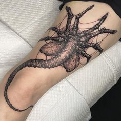 a person with a tattoo on their leg