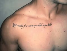 a man with a tattoo on his chest that says, i'm married to a man