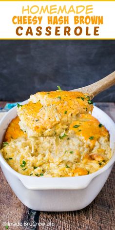 homemade cheesy hash brown casserole in a white bowl with a wooden spoon