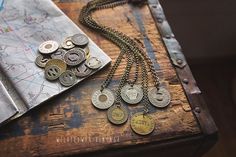 I love using vintage materials...I'm fascinated with the rich lives that these items have already lived.  These necklaces are made with authentic vintage transit tokens.  For decades, transit tokens were used for railways, subways, ferries, buses, and streetcars.  Show your appreciation for history by giving one of these tokens a second life.  They make amazing gifts for history buffs and travelers!The smaller tokens are about the size of a dime, and the larger ones are about the size of a quart Hippy Jewelry, Travel Road Trip, Gifts For History Buffs, Diy Boho, Homemade Diy, U Bahn, Amazing Gifts, Cotton Drawstring Bags, Key Necklace