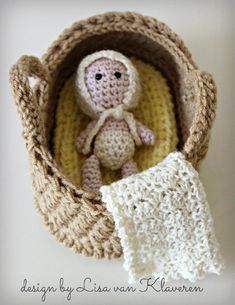 a crocheted stuffed animal in a basket