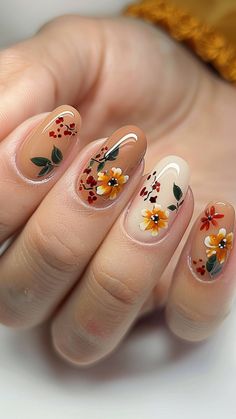 20 Fall Nail Trends You Need to Try for a Perfect Autumn Look | Lookosm Short Autumn Nail Designs, Autumn Pattern Nails, Autumn Flower Nail Art, Fall Dried Flower Nails, Autumnal Floral Nails, Anastasia Nails, Orange Fall Nails With Leaves, Ethereal Nails, Short Fall Nail