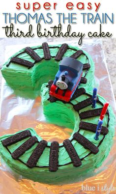 a thomas the train birthday cake on top of a table