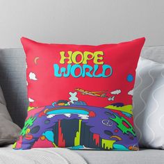 a colorful pillow with the words hope world on it