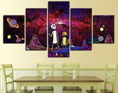 a dining room table with chairs and paintings on the wall above it, in front of a