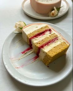 there is a piece of cake on the plate and another slice has been eaten from it