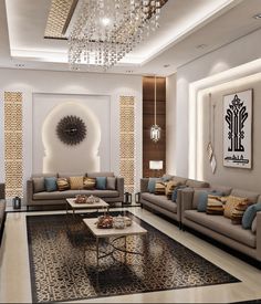 a living room filled with lots of couches and a chandelier hanging from the ceiling