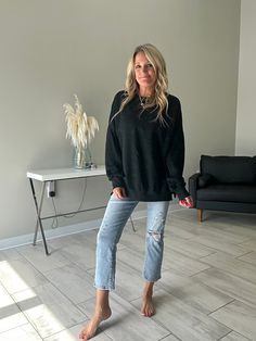 Our Kory Mineral Washed pullover sweatshirt is the perfect staple. Can be dressed up, but looks great over leggings. Fits oversize -100% Rayon-Mineral Washed-Puff Sleeve-Side Slits at hem-Loose Fit Katie normally wears a medium in sweatshirts but wears a small in this top as it fits pretty oversized. Black Stretch Sweatshirt For Fall, Black Relaxed Fit Cozy Top, Cozy Black Sweatshirt For Everyday, Black Cozy Relaxed Fit Top, Cozy Fit Black Sweater For Layering, Black Cozy Fit Sweater For Layering, Trendy Black Sweatshirt For Loungewear, Black Sweater For Loungewear, Black Sweater For Loungewear In Fall