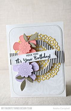 a handmade birthday card with flowers on it