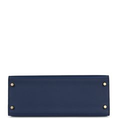 This Kelly, in the Sellier style, is in Bleu Navy epsom leather with gold hardware, has tonal stitching, front flap, two straps with center toggle closure, clochette with lock and two keys, single rolled handle and removable shoulder strap.The interior is lined with Bleu Navy chevre leather and has one zip pocket with an Hermes engraved pull and two open pockets on the opposite side.Collection: WOrigin: FranceCondition: New and never worn (plastic on hardware)Accompanied by: Hermes box, Hermes d Blue Formal Bag With Turn-lock Closure, Classic Blue Bags With Metal Hardware, Blue Leather Bag With Turn-lock Closure, Blue Office Bag With Turn-lock Closure, Hermes Kelly Sellier, Kelly Sellier, Hermes Kelly 28, Hermes Birkin 25, Hermes Box