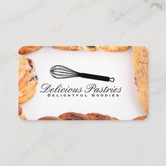 a bakery business card with pastries and a whisk on the front side