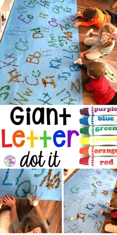 two children are playing with letters and numbers on a blue mat that says giant letter do it