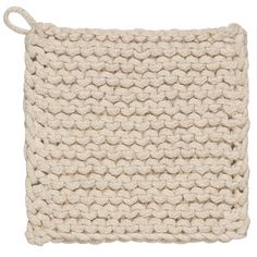 a white knitted dishcloth on a white background