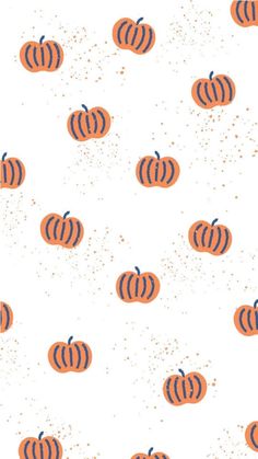 an orange and black pumpkin pattern on a white background