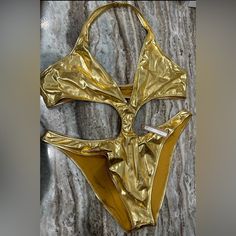 Nwt Skims 4x Gold Metallic Swim Halter Monokini Gold Stretch Swimwear For The Beach, Gold Stretch Swimwear For Beach Season, Gold One-piece Swimwear For Poolside, Gold Fitted Swimwear For Sunbathing, Gold Summer Swimwear For Swimming, Gold Fitted Swimwear For Pool, Fitted Gold Swimwear For Pool, Gold Fitted One-piece Swimwear, Gold Fitted Swimwear For The Beach