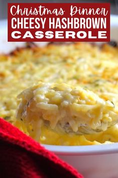 a casserole dish is being held up with a red towel in the background