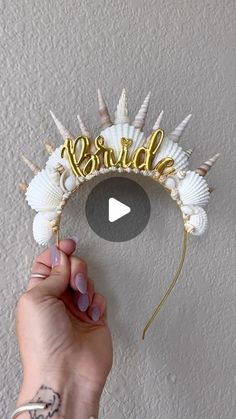 In this video, I make a crown that is made of sea shells and says "Bride" in the middle. Using different shapes of sea shells I can use pointy shells to mimic the points of a crown and round shells to add on the base of the crown. She ended up loving it at her intergalactic mermaid bachelorette! Bride To Be Crown Diy, Last Splash Mermaid Bash Bachelorette, Bachelorette Party Mermaid Theme, Bridal Shower Mermaid Theme, Sea Bachelorette Party, Sea Themed Bachelorette Party, Bachelorette Mermaid Theme, Seashell Bachelorette Party