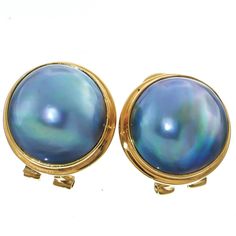 925 Silver Blue Mabe Pearl Gold Plated Sterling Omega Post Earrings, 11/16"   925 Silver Blue Mabe Pearl Gold Plated Sterling Omega Post Earrings, 11/16" Detail Hook Style: Omega Post-back Earring Material: 925 sterling silver, Gold plated Earring Size: 18mm(3/4") Earring Weight: ~4 grams/ea Pearl Type: Blue mabe pearl(15mm) Item Code: 10999-73450 Shipping Domestic US shipping is entirely FREE. International buyers, please refer to the shipping tab, typically it is $12.95. Additional items are $2/ea shipping. To assure correct calculation of combined shipping discounts, please make sure not to pay until you have collected all items in your cart   Returns We accept items for return within 30 days from receipt.   Bottom line We want you to be happy shopping with us. If we can help in any way Blue Round Earrings For Anniversary, Classic Blue Round Earrings, Blue High Luster Earrings For Formal Occasions, Formal Blue High Luster Earrings, Classic Blue Round Pearl Earrings, Blue Round Pearl Earrings For Anniversary, Blue Sterling Silver Earrings With Polished Finish, Elegant Blue Sterling Silver Clip-on Earrings, Blue Round Earrings For Formal Occasions