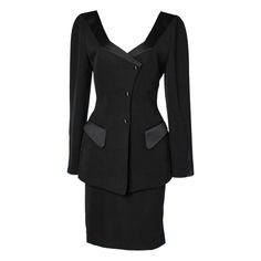 Black wool skirt-suit with black satin details Thierry Mugler | From a unique collection of rare vintage Skirt Suits at https://www.1stdibs.com/fashion/clothing/suits-outfits-ensembles/skirt-suit/. Classic Black Skirt Suit For Work, Classic Black Business Skirt Suit, Tailored Black Skirt Suit For Work, Elegant Formal Wool Skirt Suit, Elegant Wool Skirt Suit For Formal Occasions, Classic Black Skirt Suit For Office, Classic Black Skirt Suit For Business, Tailored Black Skirt Suit For Business, Classic Black Skirt Suit For The Office