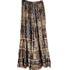 Beautiful Silky Bohemian Styling Figure Flattering One Size Really Does Fit Most Relaxed Fit Bell Bottom!! Relaxed Slimming, Ruffle Hem! This Material Is Perfect For Travel And Resort Moves Like The Finest Silk, Flowy, Dries Fast, Wrinkle Free And Packs Well!! Prints Are All Custom Imported Material!! Silky Poly!! Nwt One Size W-14" Flat H-26"Flat L-43" Appr. Top To Btm #3211 Tan/ Blue Paisleyl ***5 Patterns Available***See Other Listings ************************************************* Tags: B Bohemian Beige Flowy Skirt, Bohemian Brown Bottoms With Ruffles, Bohemian Brown Pants For Vacation, Bohemian Style Brown Pants For Vacation, Flowy Boho Print Bottoms, Bohemian Brown Bottoms For Vacation, Bohemian Flowy Skirt For Fall, Fall Bohemian Long Skirt, Bohemian Beige Bottoms With Ruffles