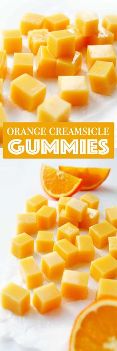 orange creamsice gummies are cut into squares and placed on top of each other