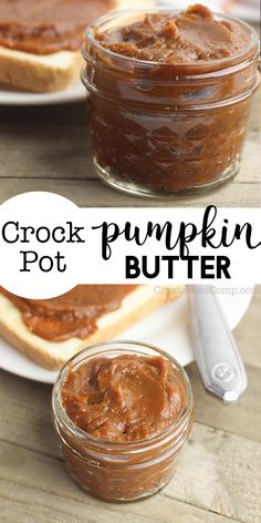 two jars of pumpkin butter sitting on top of a wooden table next to a plate with bread