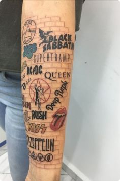 a person with a tattoo on their arm that has different types of tattoos on it