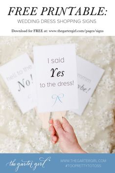 a hand holding a sign that says free printable wedding dress shopping signs