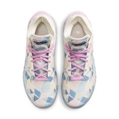 The Nike atmos x LeBron 18 Low 'Cherry Blossom' is designed in partnership with the influential Tokyo-based retailer, atmos. The spring-ready design is highlighted by a Swoosh formed with pink embroidered florals. The pastel hue is repeated on the sneaker’s molded eyelets and TPU heel counter, as well as a multicolor geometric print that enlivens the textile upper. The low-top sits on a cushy React foam midsole with a large-volume Max Air unit nestled under the heel. Pastel Hues, Geometric Print, Low Top, Cherry Blossom, Tokyo, Blossom, Cherry, Pastel, Nike