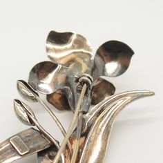 925 Sterling Silver / 1/20 12K G.F. Vintage Carl Art Floral Pin Brooch 925/ 1/20 12K Weight: 10.6g WELCOME TO PAWN SHOP We are an actual pawn shop and have been in business for over 25 years. Since 1990, our establishment has been serving a variety of clients by providing them with short term cash solutions and options of liquidity regarding their treasured heirlooms. Acknowledging that today′s customers are very sophisticated and are looking for a variety of investments, our acquisitions are ha Antique Gold Sterling Silver Brooch, Antique Gold Sterling Silver Brooches, Gold Sterling Silver Brooch For Anniversary, Gold Sterling Silver Brooches For Anniversary, Kyanite Ring, Floral Pins, Pawn Shop, Onyx Ring, Pinky Ring