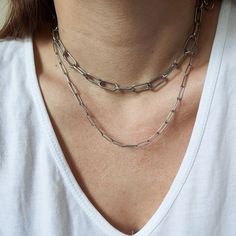 Chain choker made from thick surgical steel chain. Great quality surgical steel. It will last forever. You can layer it with other necklaces. Longer chain from the picture can be bought here: https://www.etsy.com/listing/970974592/paperclip-chain-choker-surgical-steel?ref=shop_home_active_4&frs=1&crt=1 MATERIAL 316L surgical grade stainless steel: ▪ does not cause allergic reactions, ▪ does not tarnish, stain or fade ▪ does not rust or corrode, ▪ does not change color, ▪ does not turn yo Minimalist Chain Link Choker, Everyday Stainless Steel Choker Chain Necklace, Minimalist Stainless Steel Choker Chain Necklace, Minimalist Double Chain Choker Necklace, Minimalist Chunky Chain Choker, Everyday Stainless Steel Paperclip Chain Necklace, Minimalist Stainless Steel Paperclip Chain Necklace, Minimalist Link Chain Choker, Minimalist Stainless Steel Cable Chain Necklace