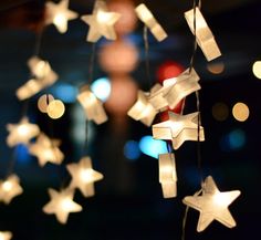 a string of paper stars hanging from the ceiling