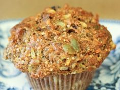 a muffin sitting on top of a blue and white plate