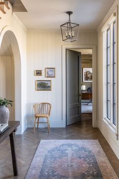 the hallway is clean and ready for us to use as an entrance way in this home