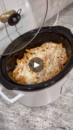 a crock pot with some food inside of it