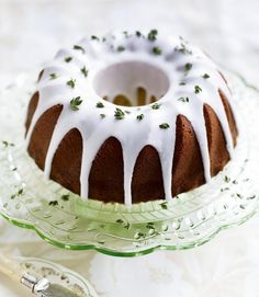 a bundt cake sitting on top of a glass plate