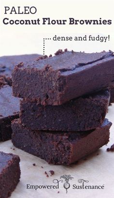 three pieces of chocolate brownie stacked on top of each other in a metal plate