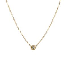 Our Diamond Solitaire Bezel Necklace features a round brilliant-cut diamond effortlessly balanced within a minimal gold bezel. Anchored by a delicate but sturdy 14K cable chain, this is a staple necklace for any stack. Wear this solid 14K necklace everyday!

Small - 0.04ct
Medium - 0.07ct
Large - 0.12ct
High 
Quality G-H Color VS2-SI1 Clarity Natural Diamond

Solid 14K Gold
Lifetime Guarantee
Made in Los Angeles Staple Necklace, Minimal Gold, Necklace Everyday, Bezel Necklace, Diamond Solitaire Necklace, Recycled Gold, Necklace Sizes, Personalized Necklace, Round Brilliant Cut Diamond