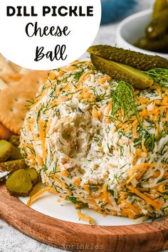 dill pickle cheese ball on a plate with crackers